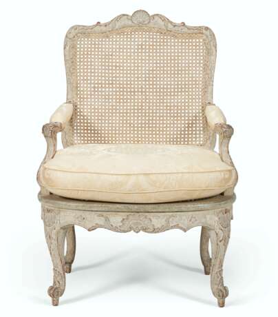 A REGENCE GRAY-PAINTED AND CANED FAUTEUIL - photo 1
