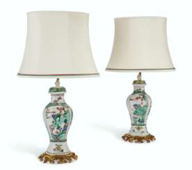 A PAIR OF FRENCH ORMOLU-MOUNTED CHINESE FAMILLE VERTE PORCELAIN BALUSTER VASES AND COVERS, MOUNTED AS LAMPS