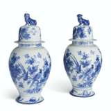 A PAIR OF DUTCH DELFT BALUSTER JARS AND COVERS - photo 1