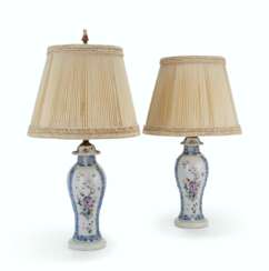 A PAIR OF CHINESE EXPORT FAMILLE ROSE PORCELAIN BALUSTER VASES AND COVERS, MOUNTED AS LAMPS