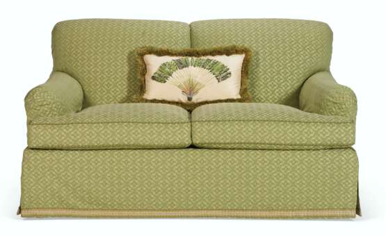 AN UPHOLSTERED TWO SEAT SOFA - photo 1