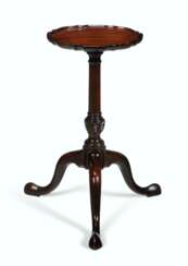 AN EARLY GEORGE III MAHOGANY KETTLE STAND