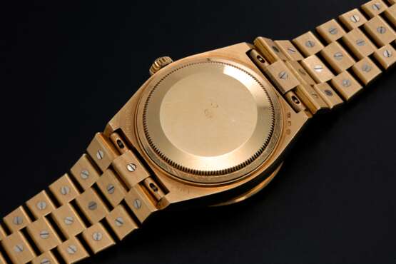 Rolex. ROLEX, A YELLOW GOLD DAY-DATE OYSTERQUARTZ SET WITH DIAMONDS AND SAPPHIRES, REF: 19168 - photo 2