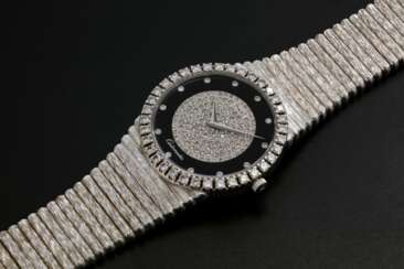 PIAGET, A GOLD SLIM DRESS WATCH WITH ONYX DIAL AND DIAMOND-CRUSTED BEZEL, REF. 12336