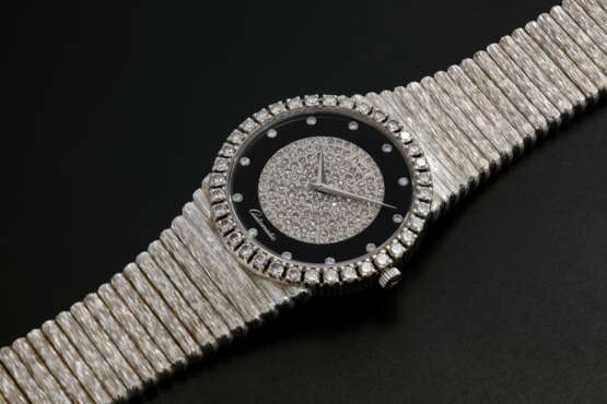 Piaget. PIAGET, A GOLD SLIM DRESS WATCH WITH ONYX DIAL AND DIAMOND-CRUSTED BEZEL, REF. 12336 - фото 1