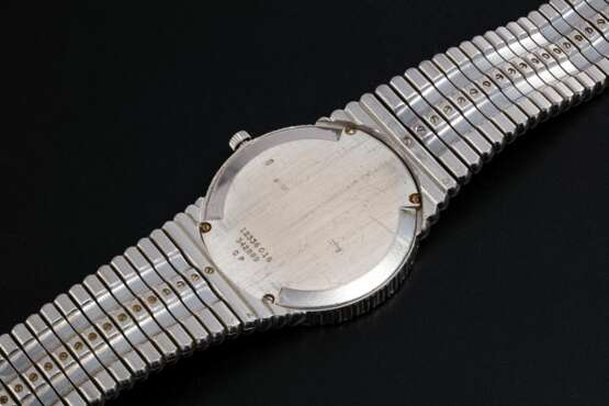 Piaget. PIAGET, A GOLD SLIM DRESS WATCH WITH ONYX DIAL AND DIAMOND-CRUSTED BEZEL, REF. 12336 - photo 2