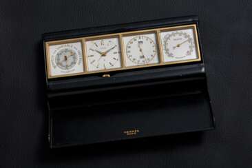 HERMÈS, A GILT BRASS, CHROMED STEEL, AND LEATHER COMPENDIUM DESK CLOCK