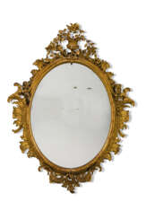 A ROCOCO REVIVAL GILTWOOD AND COMPOSITION MIRROR