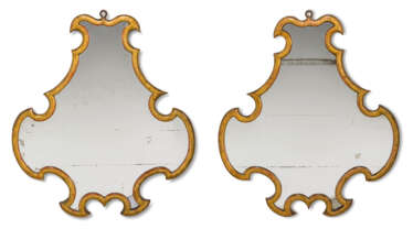 A PAIR OF ITALIAN GILT-FRAMED CARTOUCHE-SHAPED MIRRORS