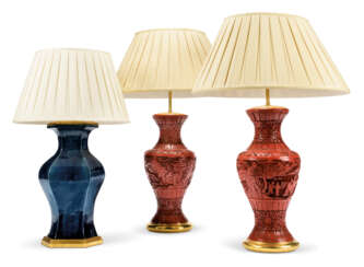 A PAIR OF RED CINNABAR-LACQUER-STYLE TABLE LAMPS