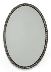 A IRISH GEORGE III OVAL CUT-GLASS AND TOLE MIRROR