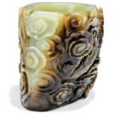 A CHINESE MOTTLED GREENISH-WHITE AND BROWN JADE WASHER - photo 3