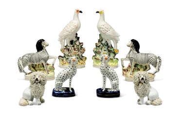 A PAIR OF STAFFORDSHIRE POTTERY MODELS OF PHEASANTS