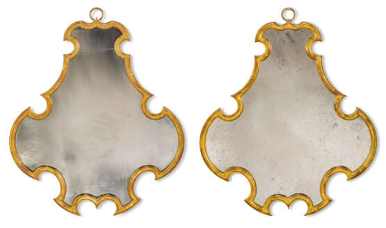 A PAIR OF GILT-FRAMED CARTOUCHE-SHAPED MIRRORS - photo 2