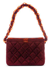 A BURGUNDY QUILTED SUEDE LUNCHBOX BAG WITH TORTOISE LUCITE HARDWARE