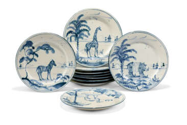 TEN ISIS BLUE AND WHITE DELFT-STYLE &#39;EXOTIC ANIMAL&#39; PLATES FOR COLEFAX AND FOWLER