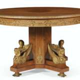 A FRENCH ORMOLU-MOUNTED BURR-AMBOYNA CIRCULAR EXTENSION DINING TABLE - photo 2