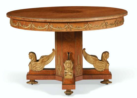 A FRENCH ORMOLU-MOUNTED BURR-AMBOYNA CIRCULAR EXTENSION DINING TABLE - photo 3