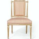 A SET OF FOURTEEN LATE GEORGE III CREAM-PAINTED AND PARCEL-GILT CHAIRS - photo 6