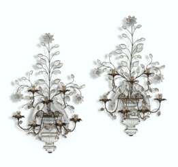 A PAIR OF CUT, PRESSED AND FOIL-BACK GLASS AND GILT-METAL SEVEN LIGHT WALL LIGHTS