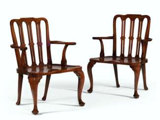 A PAIR OF GEORGE II SOLID MAHOGANY HALL ARMCHAIRS