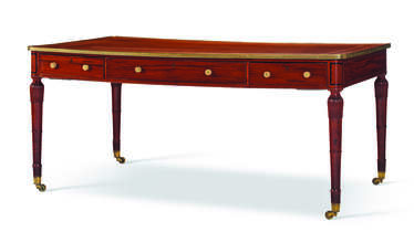 A LATE GEORGE III MAHOGANY PARTNERS LIBRARY TABLE
