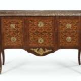A LATE LOUIS XV ORMOLU-MOUNTED TULIPWOOD, AMARANTH, AND PARQUETRY COMMODE - photo 1