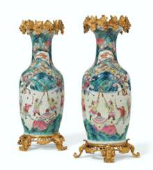 A VERY LARGE PAIR OF ORMOLU-MOUNTED CHINESE EXPORT FAMILLE ROSE PORCELAIN VASES