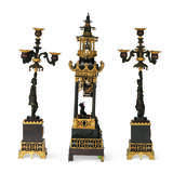 A FRENCH PATINATED, GILT, AND COLD-PAINTED BRONZE THREE-PIECE CLOCK GARNITURE - фото 3