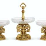 A FRENCH ORMOLU AND CUT-GLASS THREE-PIECE TABLE GARNITURE - photo 1