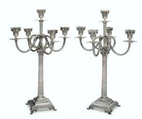 A PAIR OF PORTUGUESE SILVER FIVE-LIGHT CANDELABRA