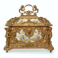 A GILT-METAL MOUNTED GERMAN PORCELAIN JEWEL CASKET AND COVER