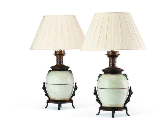 A PAIR OF FRENCH PATINATED BRONZE-MOUNTED CHINESE CREAM CRACKLE-GLAZED JARS, MOUNTED AS LAMPS - photo 1