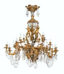 A LARGE FRENCH ORMOLU, CUT AND MOLDED GLASS THIRTY-LIGHT CHANDELIER
