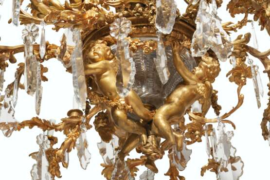 A LARGE FRENCH ORMOLU, CUT AND MOLDED GLASS THIRTY-LIGHT CHANDELIER - фото 2