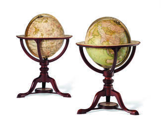 A PAIR OF REGENCY MAHOGANY TABLE GLOBES