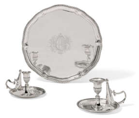 A GEORGE III SILVER SALVER AND TWO GEORGE III SILVER CHAMBER CANDLESTICKS