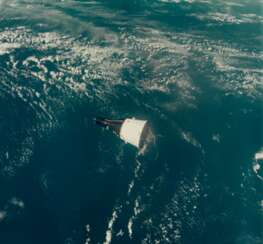First rendezvous in space: Gemini VII spacecraft as seen from the Gemini VI-A spacecraft, 3 views of the spacecraft over the Earth, December 15, 1965
