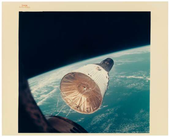 NASA. First rendezvous in space: Gemini VII spacecraft as seen from the Gemini VI-A spacecraft, 3 views of the spacecraft over the Earth, December 15, 1965 - photo 5