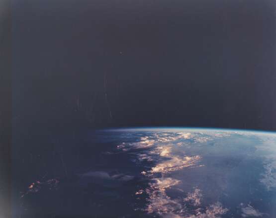 NASA. The luminous Earth at sunset: view from Apollo 9 spacecraft, March 10, 1969 - photo 1