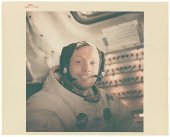 NASA. Portrait of Neil Armstrong back in the LM after the historic moonwalk, July 16-24, 1969 - фото 2