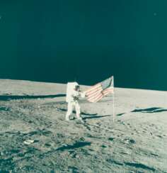The second Moon landing: the launch of Apollo 12; astronaut Pete Conrad unfurls the American flag, November 14-24, 1969