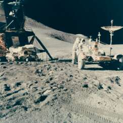 Two views of Astronaut James Irwin servicing the lunar rover during Apollo 15 moonwalk, July 26-August 7, 1971