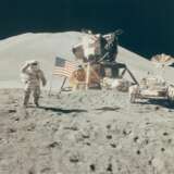 NASA. Saluting the flag: Astronaut David Scott performs military salute beside American flag, lunar module "Falcon" and lunar rover, Hadley Delta beyond, July 26-August 7, 1971 - фото 1