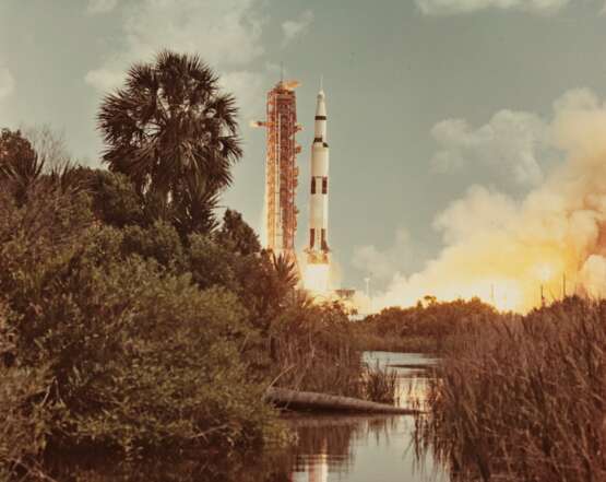 NASA. The Earth-Moon round trip: Saturn V rocket (Apollo 16) lifts off from Cape Canaveral, Florida; an almost entire view of the nearly full planet Earth from Apollo 16 spacecraft, April 16-27, 1972 - photo 4