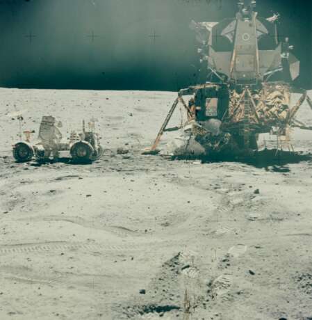 NASA. Experiments on the Moon: astronaut John Young beside the lunar rover and lunar module "Orion"; sun-drenched view of "thumper" imprints on the lunar surface; lunar rover parked on the slopes of Stone mountain, April 16-27, 1972 - фото 1