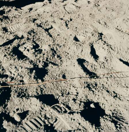 NASA. Experiments on the Moon: astronaut John Young beside the lunar rover and lunar module "Orion"; sun-drenched view of "thumper" imprints on the lunar surface; lunar rover parked on the slopes of Stone mountain, April 16-27, 1972 - photo 4