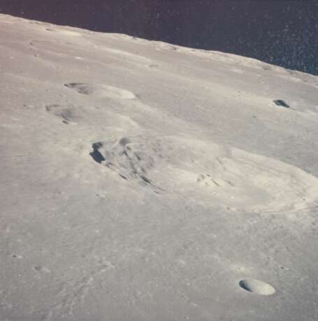 NASA. Moonscapes: Three views of mountains and craters on the lunar surface, from the Apollo 16 spacecraft, April 16-27, 1972 - photo 1