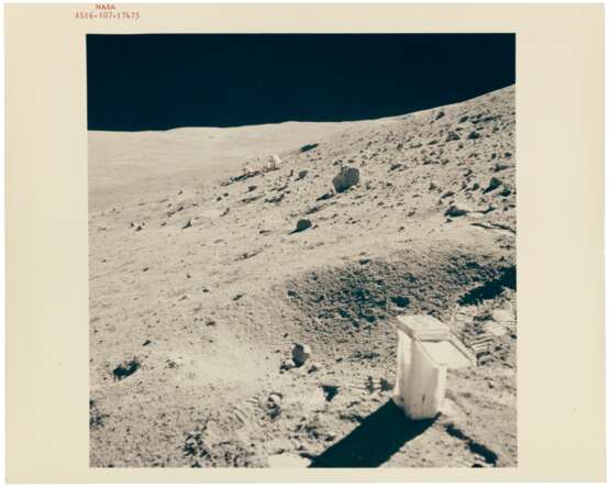 NASA. Experiments on the Moon: astronaut John Young beside the lunar rover and lunar module "Orion"; sun-drenched view of "thumper" imprints on the lunar surface; lunar rover parked on the slopes of Stone mountain, April 16-27, 1972 - фото 8
