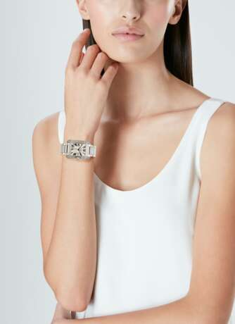 Cartier. CARTIER DIAMOND AND WHITE GOLD 'TANK ANGLAISE' WRISTWATCH - фото 2